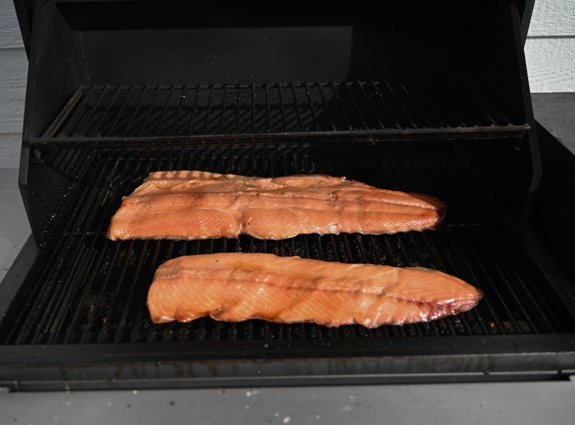 smoked steelhead fish on the grill